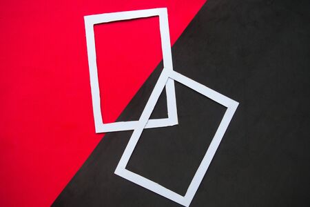 Two white mockup photo frames on black and red geometricの写真素材