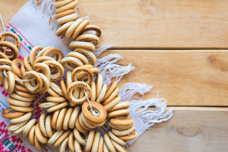 Sushki on wooden background. Flat lay, top view. Russian national traditions