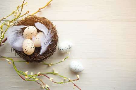 quail eggs in the nest, top view, wooden background, Easter concept