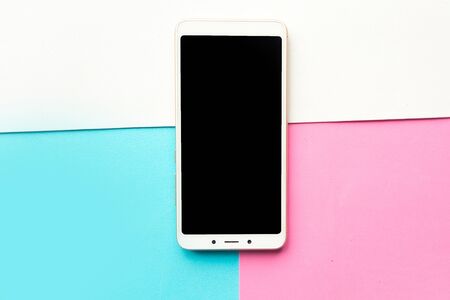 Mockup mobile on geometric color background. Minimal conceptの写真素材