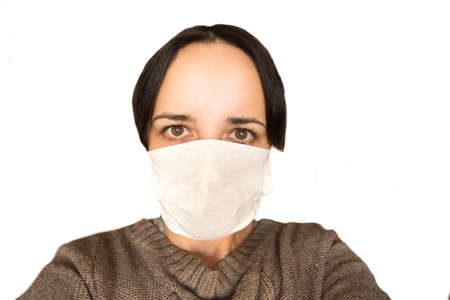 Minsk/Belarus - October 20 2019: Beautiful girl in madical mask isolated on white. Covid19 conceptのeditorial素材