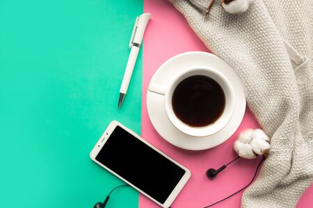 Flat lay photo with coffee cup and mockup phone. Office conceptの写真素材