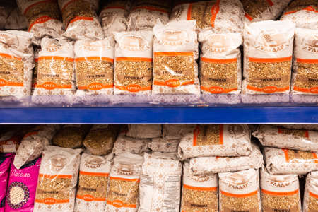 Minsk/ Belarus - March 20 2020: Buckwheat on the shelves in the store. Panic because of coronavirus. Quarantine-2020 conceptのeditorial素材