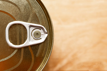 canned meat pack as a quarantine stock on wooden background