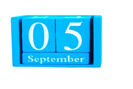 Wooden calendar september 5, isolated on whiteの写真素材