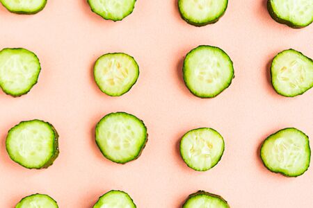 Cucumber pattern on pastel pink background. Minimal conceptの写真素材