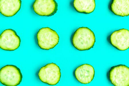 Cucumber pattern on bright blue background. Minimal concept.の写真素材