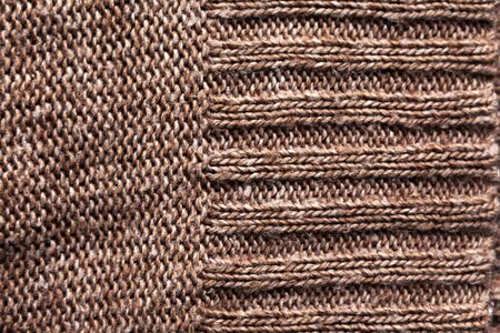 texture of a knitted brown sweater, closeupの写真素材