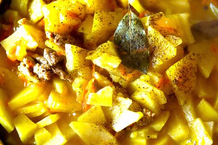 Tasty home made potato stew with meat in the pan, closeupの写真素材