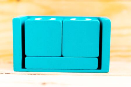 Blue cube calendar with space for your text on wooden backgroundの写真素材