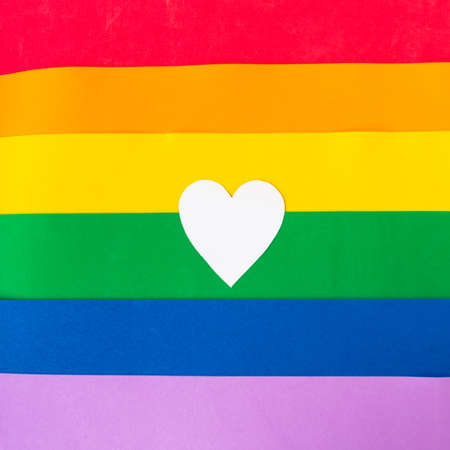 White mockup heart on LGBTQ colors flag, top viewの写真素材
