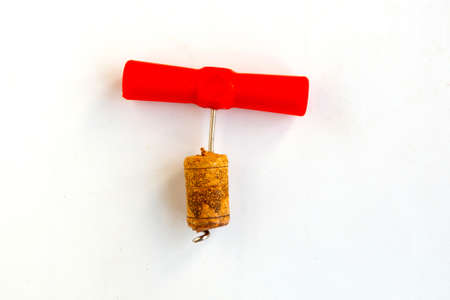 Corkscrew with wine stopper isolated on white background, top viewの写真素材