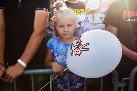 Minks / Belarus - 30 July 2020: portrait of little girl in the crowd of peopleのeditorial素材
