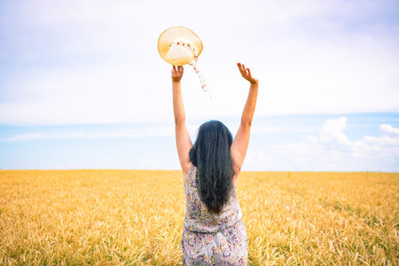 young woman wheat field, summer background