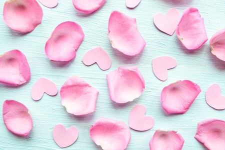 rose petals on wooden background. Valentineâs Day backgroundの写真素材