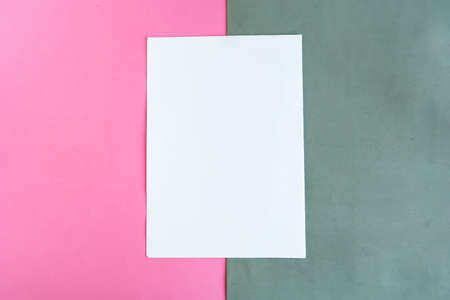 White mockup blank on geometric gray and pink background, copy space for the textの写真素材