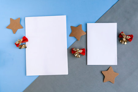 Two white mockup blanks and Christmas decorations on color background. Copy space for the text....