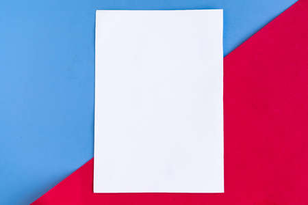 White mockup blank on geometric blue and red background, copy space for the textの写真素材