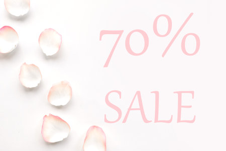 Valentines Day sale concept with rose petals at pink background, top viewの写真素材
