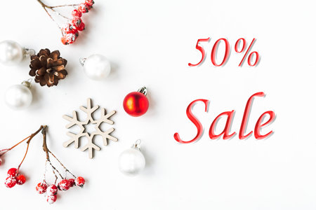 Christmas sale concept with decorations on white background, top viewの写真素材