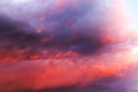 Colorful cloudy sky at sunset. Gradient color. Sky texture, nature backgroundの写真素材