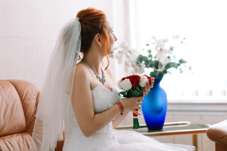Portrait of young bride in wedding dress and veil, close upの写真素材
