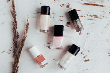 Beautiful flat lay photo with nail polish bottlesの写真素材