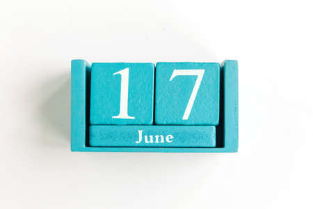 June 17. Blue cube calendar with month date isolated on white background.の写真素材