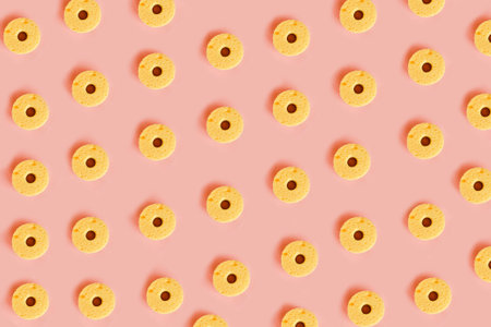 Seamless pattern of yellow sponges for washing dishes on pink background. minimal concept. Copy space for your textの写真素材