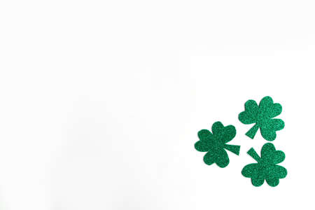 Three shamrocks isolated on white background. minimal concept. Copy space for the text. happy st. Patrick's Dayの写真素材
