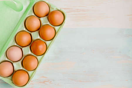 Raw chicken eggs in egg box. food background. copy spaceの写真素材