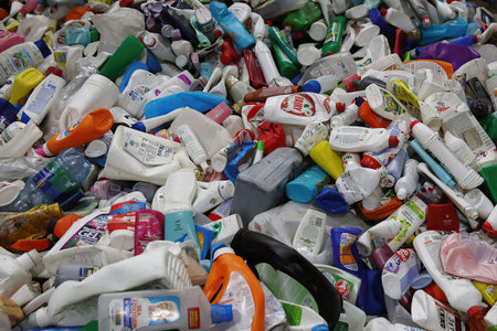 Minsk Belarus â€“ March 17 2021: Plastic waste. Dirty plastic bottles and bags on a garbage