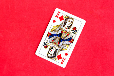 Minsk Belarus - October 1 2020: Queen of Diamonds playing card, red background.
