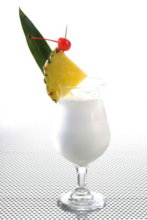 Pina Colada cocktail on the table, close up