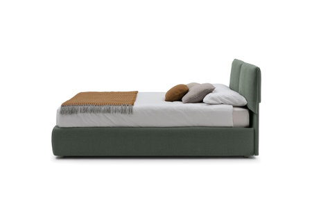 Classic luxury bed in pastel colors isolated on whiteの写真素材