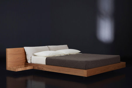 Comfortable double bed with pillows in modern interior. 3d renderの写真素材