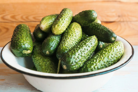 Fresh cucumbers in a bowl