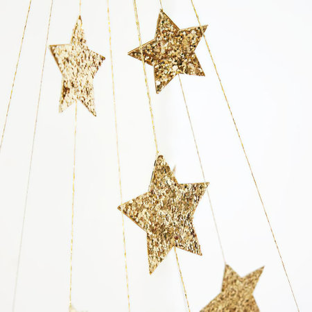 Christmas decoration with golden stars on white background. Festive concept.の写真素材