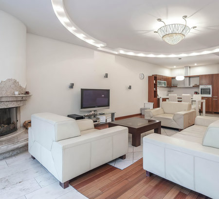 Luxury living room with white sofas and fireplace. Nobody insideの写真素材
