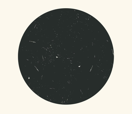 Black circle with a texture of scratches, grain, abrasions. Graphic design element in minimalist poster style, round texture background. Vector illustration in abstract geometric motif.のイラスト素材