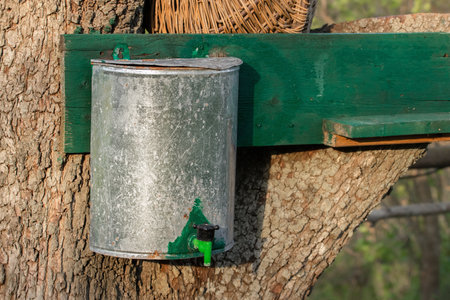 Metal rustic hand wash basin on wood.の写真素材