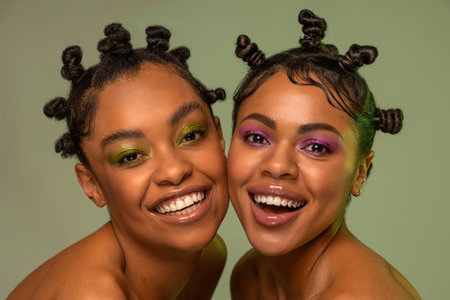 Portrait of a two beautiful young African american women .