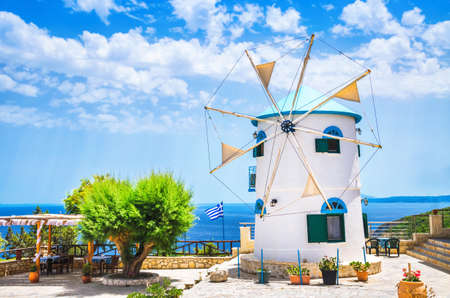 Traditional white windmill at summer day. Zakynthos. Greek island.の写真素材