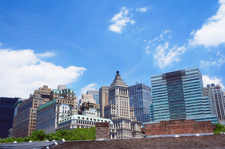 New York City summer skyline from Battery park. Image taken in the Castle Clinton.のeditorial素材