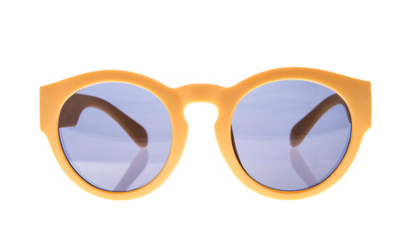 Yellow sunglasses on white isolated backgroundの写真素材