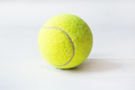 Tennis ball on a white backgroundの写真素材