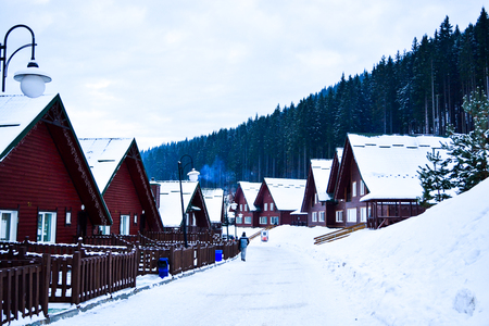 BUKOVEL, UKRAINE - December 17, 2016: Wooden house in mountains in ski resort Bukovel, Ukraine. Bukovel is a most popular ski resort in Ukraine, in 2012 was named the fastest-growing world ski resort.のeditorial素材