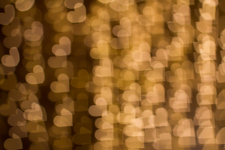 Blurring lights bokeh background of heartsの写真素材