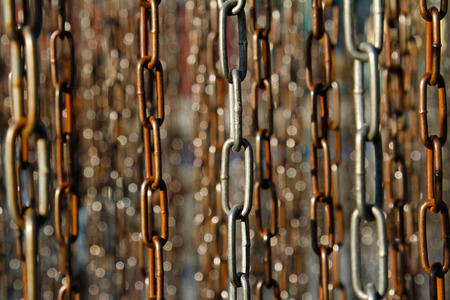 Abstract background of old rusty metal chainsの写真素材