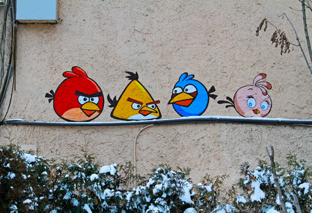 Moscow, Russia - January 16, 2016: Street art or graffiti with angry birds by unidentified artist on wall in Moscowのeditorial素材